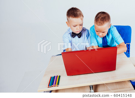 boys at a computer on the Internet school lessons 60415148