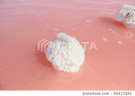 Flooded buildings in the place of extraction of sea salt. Because of time the wooden beams were Flooded buildings in the place of extraction of sea salt. Because of time the wooden beams were 60415843