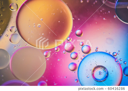 Multicolored abstract defocused background picture made with oil, water and soap Multicolored abstract defocused background picture made with oil, water and soap 60416286