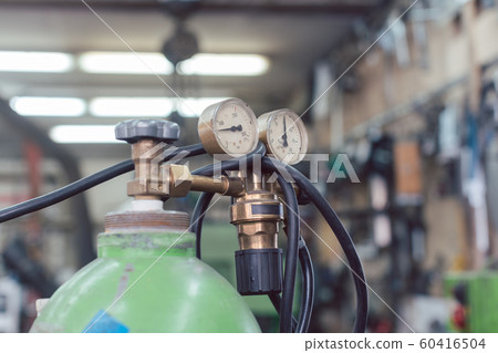 Gauge and valve on top of tanks for welding gas 60416504