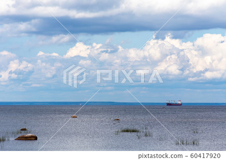 Fishing boat in clear lake at sunset. Scenic view. 60417920