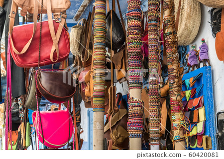 Craft wicker hats, bags and other souvenirs in Morocco market Craft wicker hats, bags and other souvenirs in Morocco market 60420081