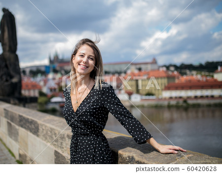 woman on Charles bridge in Prague, Czech Perublic 60420628