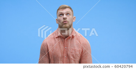 Young man making a face Young man making a face 60420794