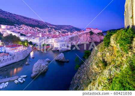 Dubrovnik. Aerial view of the harbor at sunset. 60421030