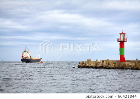 Picture of a ship leaving port. Picture of a ship leaving port. 60421844