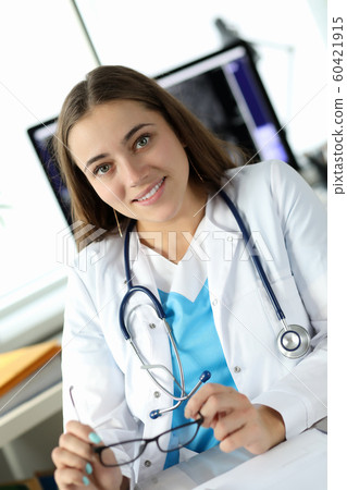 Cute doctor in clinic cabinet Cute doctor in clinic cabinet 60421915