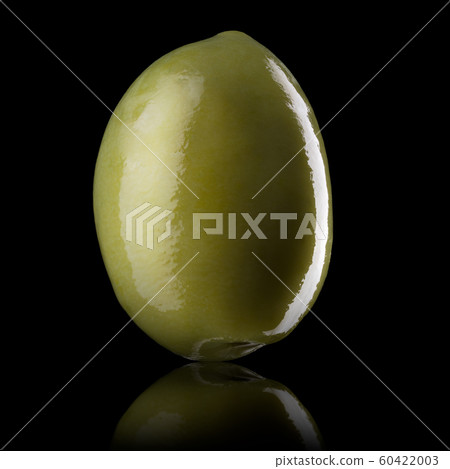 Macro photo of green olive with reflection of light isolated on a black Macro photo of green olive with reflection of light isolated on a black 60422003
