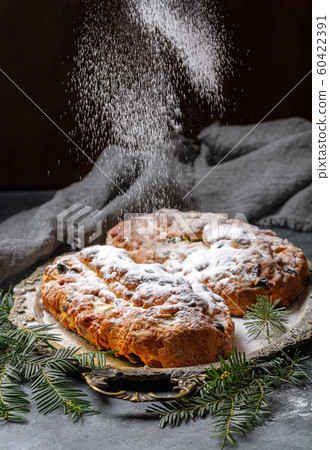 Homemade Stollen sprinkled with powdered sugar. Homemade Stollen sprinkled with powdered sugar. 60422391
