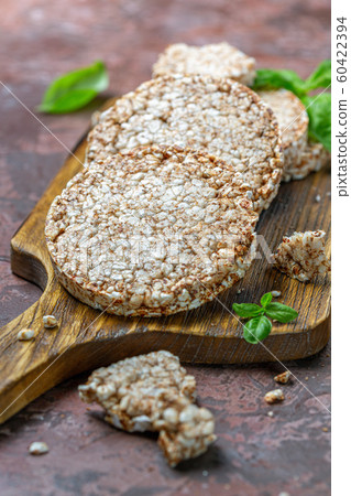 Round whole grain cereal crispbreads. Round whole grain cereal crispbreads. 60422394
