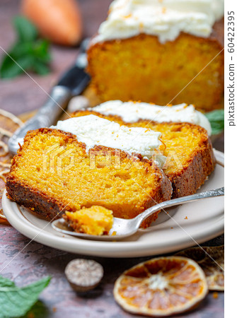 Slices of spicy cake with cottage cheese cream. Slices of spicy cake with cottage cheese cream. 60422395