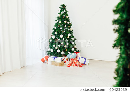Christmas tree with gifts holiday new year interior decor as background Christmas tree with gifts holiday new year interior decor as background 60423989