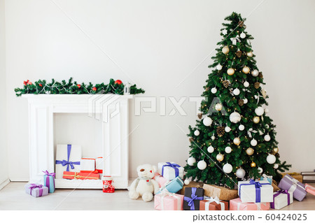 Christmas tree with gifts in the new year decor winter interior Christmas tree with gifts in the new year decor winter interior 60424025