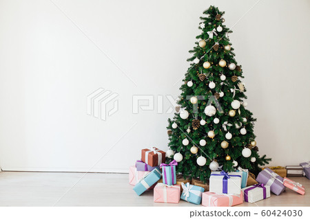 Christmas tree with gifts in the new year decor winter interior Christmas tree with gifts in the new year decor winter interior 60424030