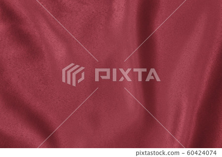Dark red colored Background of soft draped fabric 60424074