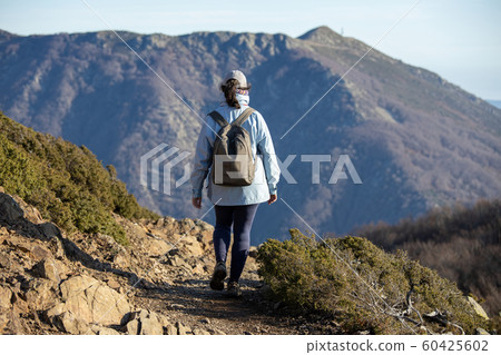 Spanish tourist woman walking in the Spanish 60425602