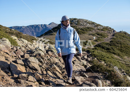 Spanish tourist woman walking in the Spanish Spanish tourist woman walking in the Spanish 60425604