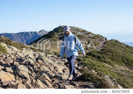 Spanish tourist woman walking in the Spanish Spanish tourist woman walking in the Spanish 60425605