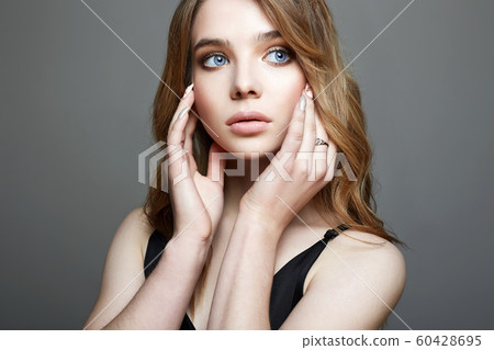 Young beautiful woman portrait. Blue eyes 60428695