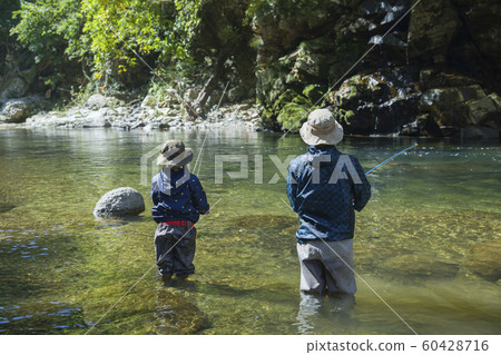 Mountain stream fishing image Parent and child family 60428716