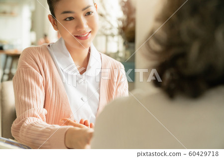 Female care conversation 60429718