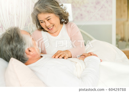 Elderly couple lifestyle waking up Elderly couple lifestyle waking up 60429788