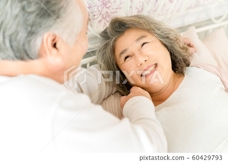 Elderly couple lifestyle waking up Elderly couple lifestyle waking up 60429793