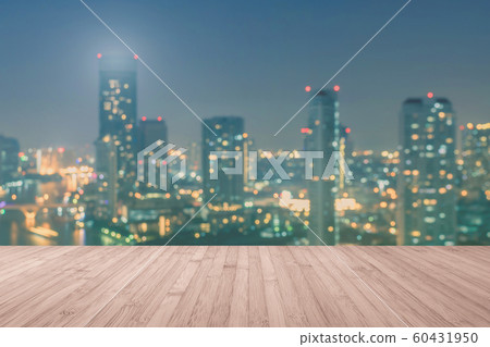 Wood floor terrace or wooden table with blur background rooftop perspective view city night light bokeh 60431950