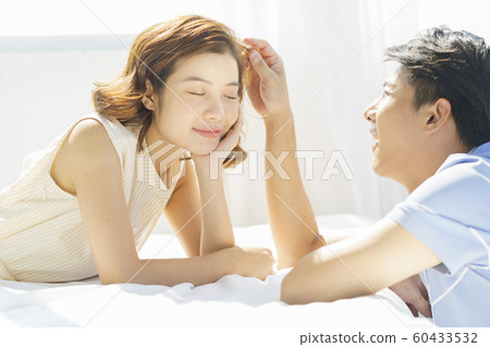 Couple lifestyle bedroom Couple lifestyle bedroom 60433532