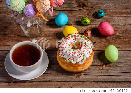 Easter cake and colorful eggs on a dark background Easter cake and colorful eggs on a dark background 60436122