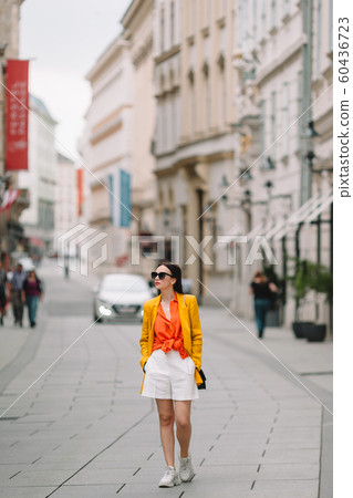 Young woman in Vienna outdoors during holidays in Europe. Young woman in Vienna outdoors during holidays in Europe. 60436723