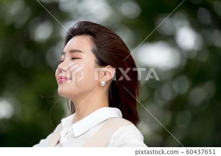 The look of a beautiful Korean woman, a park walk The look of a beautiful Korean woman, a park walk 60437651