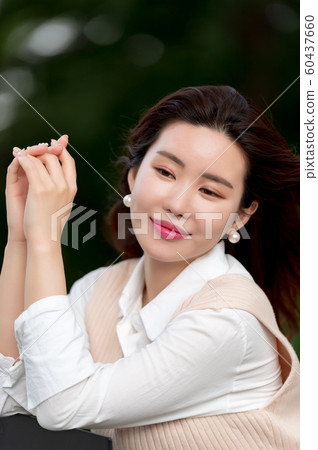 The look of a beautiful Korean woman, a park walk The look of a beautiful Korean woman, a park walk 60437660