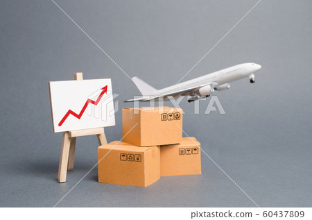 Airplane plane takes off behind stack of cardboard boxes and stand with red up arrow. concept of air cargo and parcels, airmail. Fast delivery of goods and products. Cargo aircraft. Logistics, Airplane plane takes off behind stack of cardboard boxes and stand with red up arrow. concept of air cargo and parcels, airmail. Fast delivery of goods and products. Cargo aircraft. Logistics, 60437809