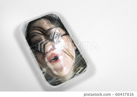 Human head as a goods in plastic box isolated on white background, ecology concept 60437816