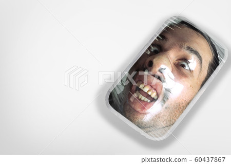 Human head as a goods in plastic box isolated on white background, ecology concept 60437867