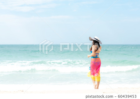 Summer Holiday. Lifestyle woman chill holding big hat Summer Holiday. Lifestyle woman chill holding big hat 60439453