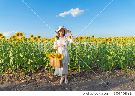 Portrait of happy Asian woman enjoying and Portrait of happy Asian woman enjoying and 60440981
