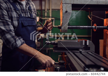 Operator working on the machine Operator working on the machine 60442744