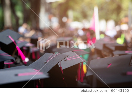 shot of graduation hats during commencement  60443100