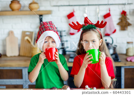 Good morning. Brother and sister drink tea at the 60443301