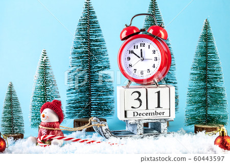 Happy New Year greeting card. alarm clock on a Happy New Year greeting card. alarm clock on a 60443597