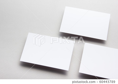 Business card blank on wooden background. Corporate Stationery, Branding Mock-up. Creative designer desk. Flat lay. Copy space for text 60443789