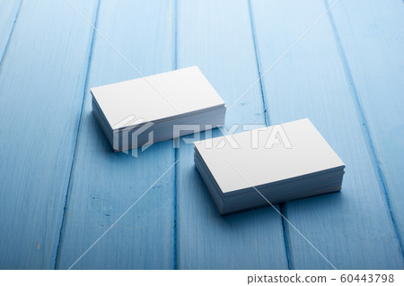 Business card blank on wooden background. Corporate Stationery, Branding Mock-up. Creative designer desk. Flat lay. Copy space for text 60443798