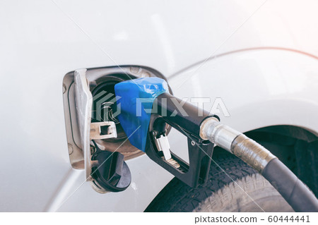 Colorful Petrol pump filling nozzles isolated on Colorful Petrol pump filling nozzles isolated on 60444441