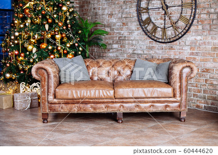 Interior with couch and Decorated Christmas tree Interior with couch and Decorated Christmas tree 60444620