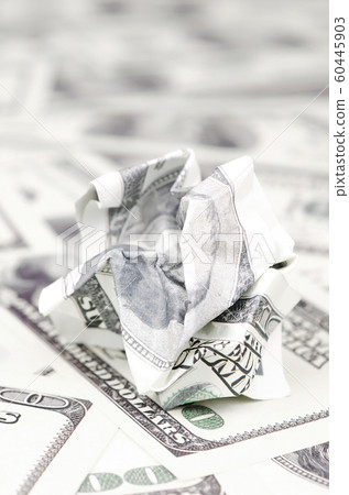 Crumpled dollar bill of the United States lies on 60445903