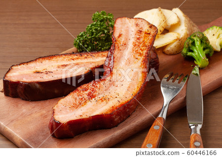 Saute of thick-cut bacon 60446166