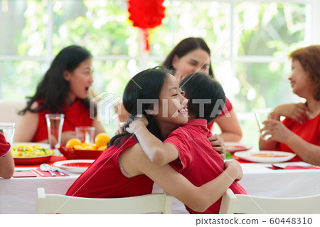 Chinese New Year family celebration. Chinese New Year family celebration. 60448310