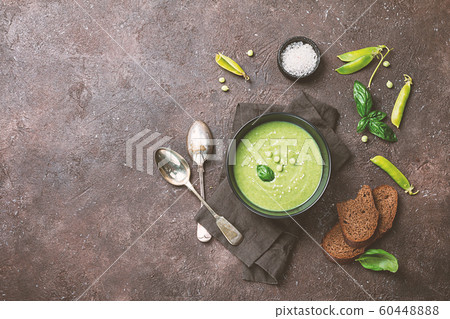 Green pea soup in bowl Green pea soup in bowl 60448888